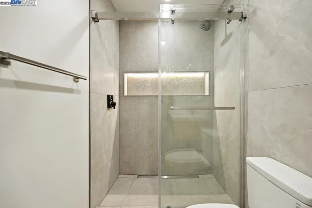 an aerial view of a house with a garden