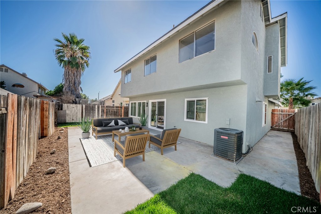 2017 Cherrytree Drive Perris, CA 92571 - Photo 11 of 20 a view of a house with backyard and sitting area