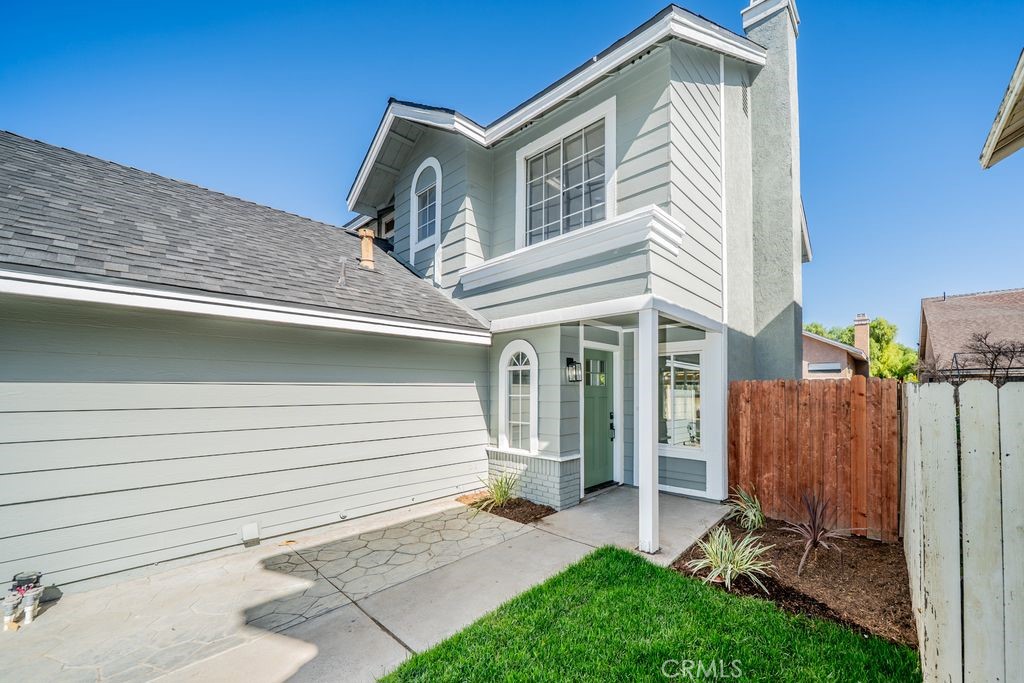 2017 Cherrytree Drive Perris, CA 92571 - Photo 17 of 20 a front view of a house with a yard