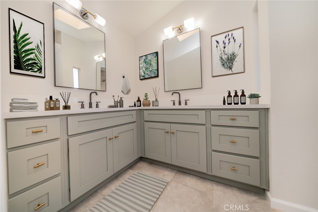 2017 Cherrytree Drive Perris, CA 92571 - Photo 6 of 20 a bathroom with a double vanity sink mirror and