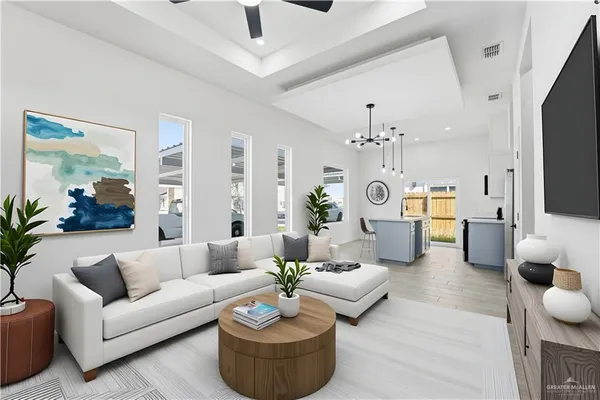 a living room with furniture kitchen view and a chandelier