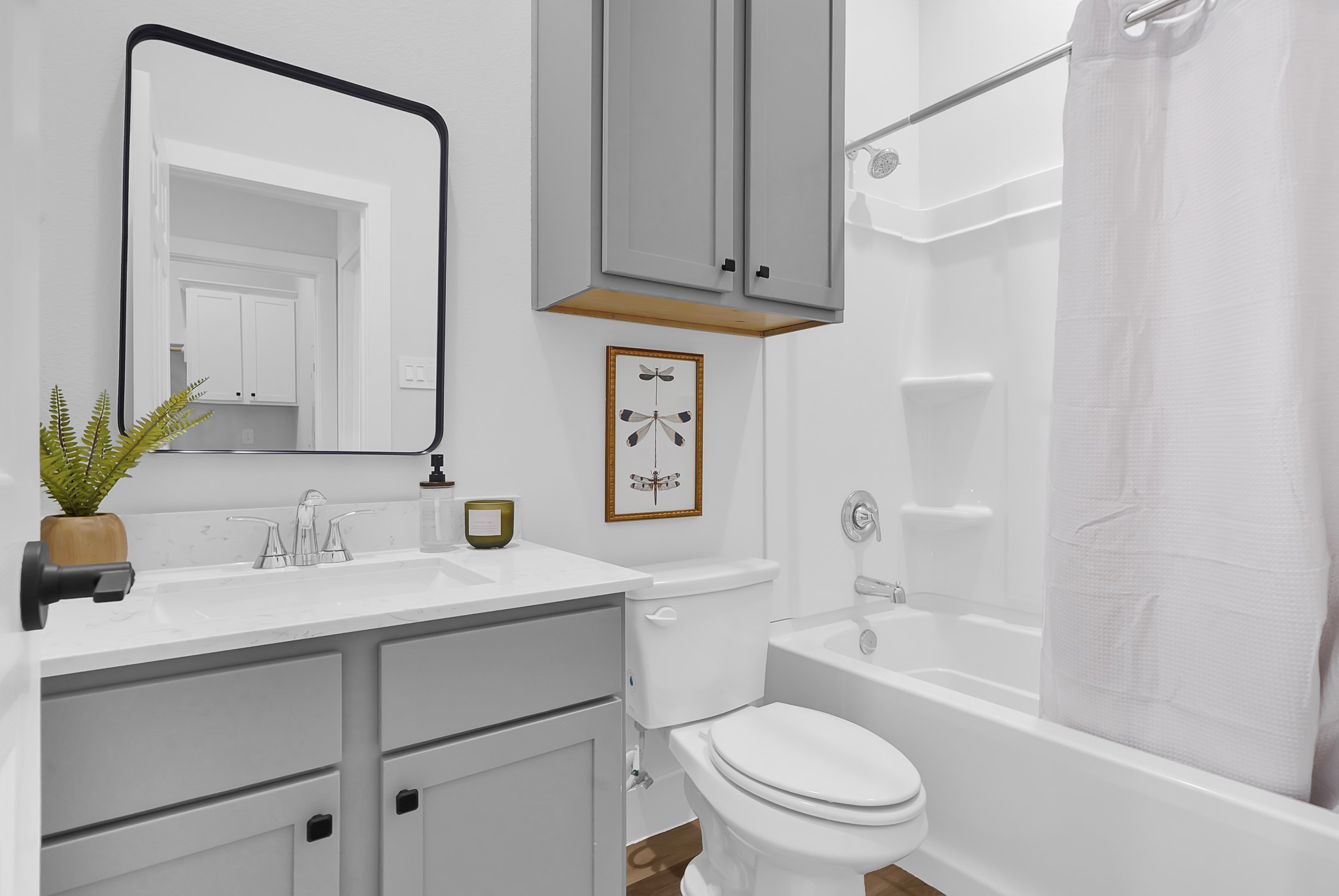 38634 Spur 149 Road, Unit 22A Magnolia, TX 77354 - Photo 16 of 48 a bathroom with a sink a toilet and shower