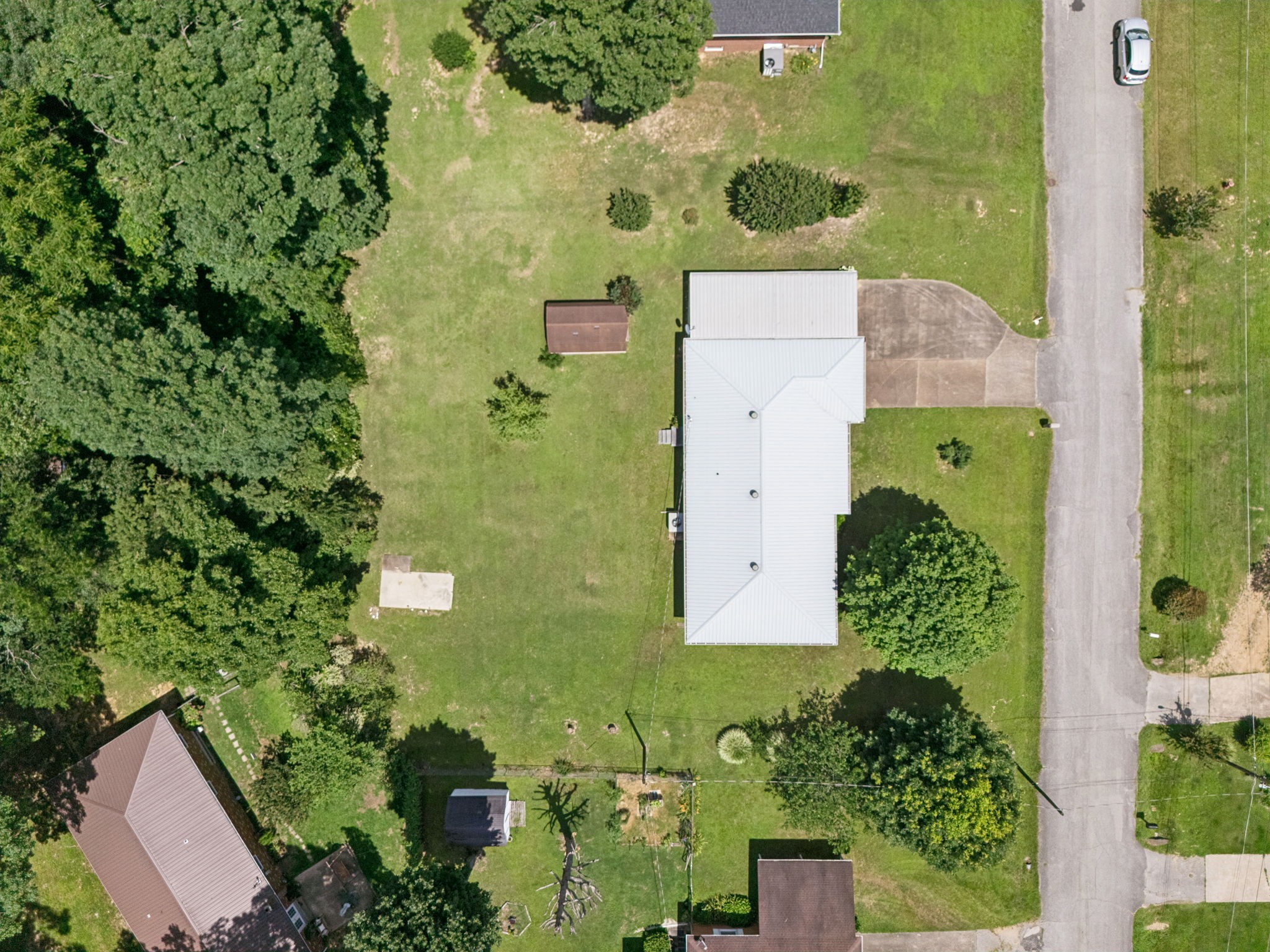 708 Hickory Street Centerville, TN 37033 - Photo 49 of 57 an aerial view of a residential houses with yard
