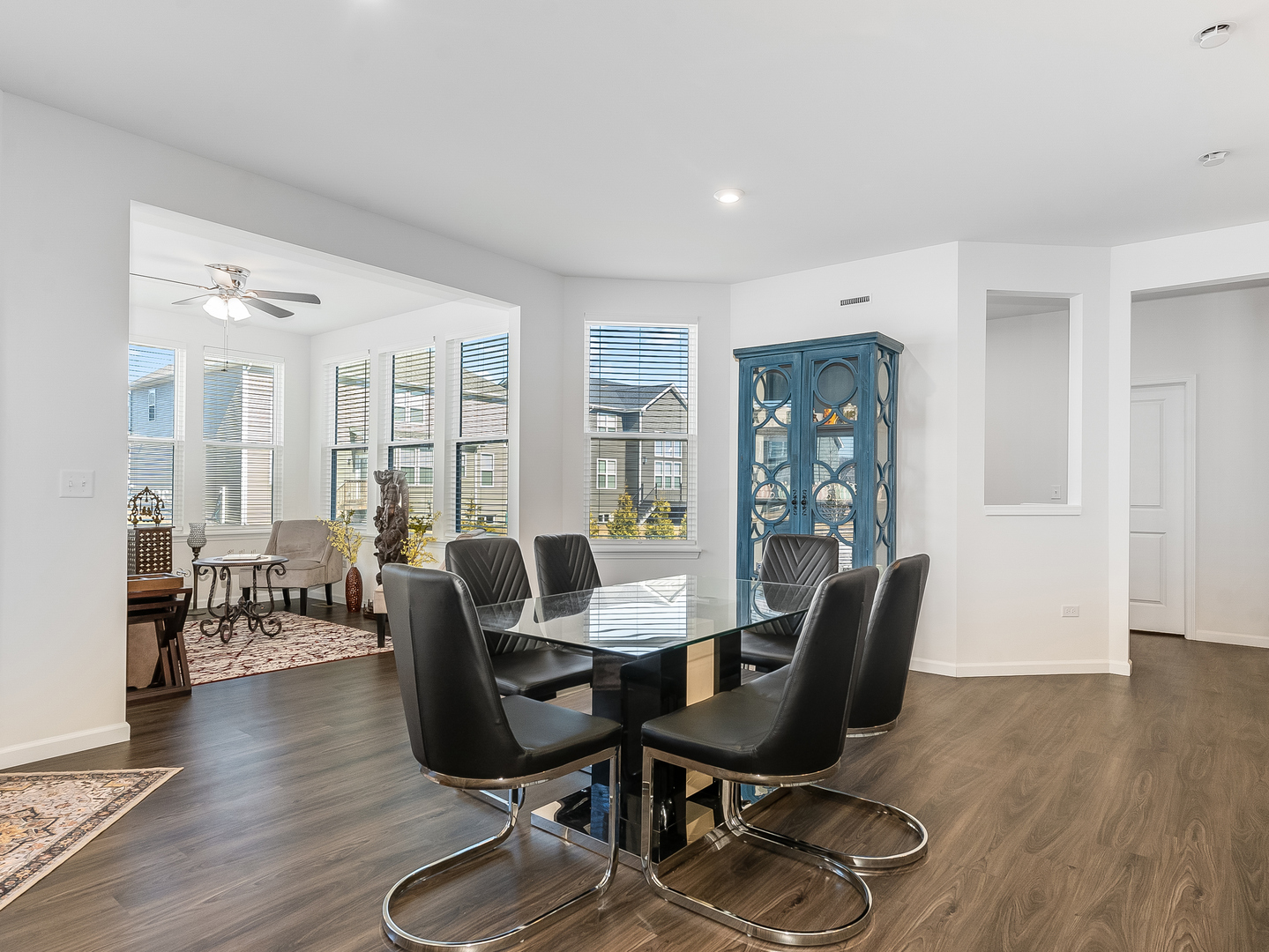 2552 Weatherbee Lane Naperville, IL 60563 - Photo 12 of 43 a view of a dining room with furniture window and wooden floor