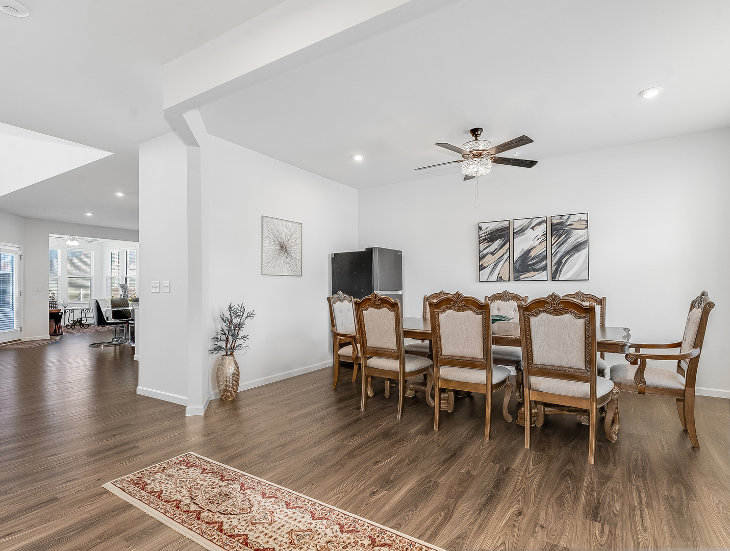 2552 Weatherbee Lane Naperville, IL 60563 - Photo 18 of 43 a view of a dining room with furniture and wooden floor
