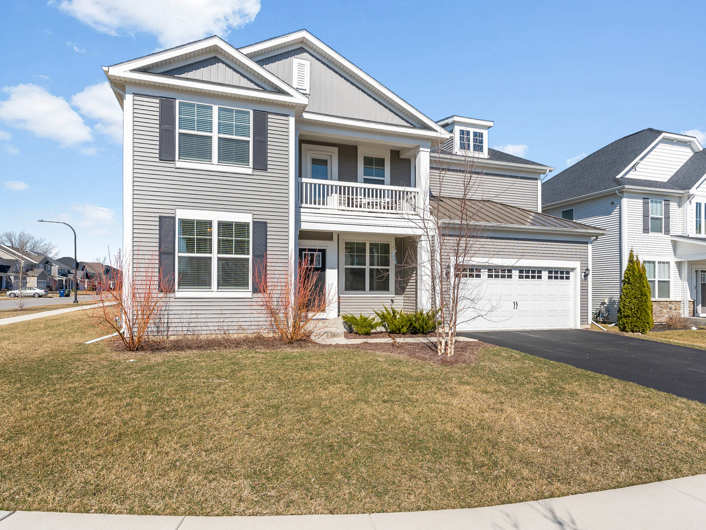 2552 Weatherbee Lane Naperville, IL 60563 - Photo 2 of 43 a front view of a house with a yard
