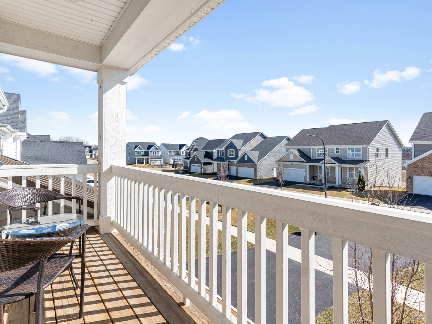 2552 Weatherbee Lane Naperville, IL 60563 - Photo 3 of 43 a view of a street from a balcony