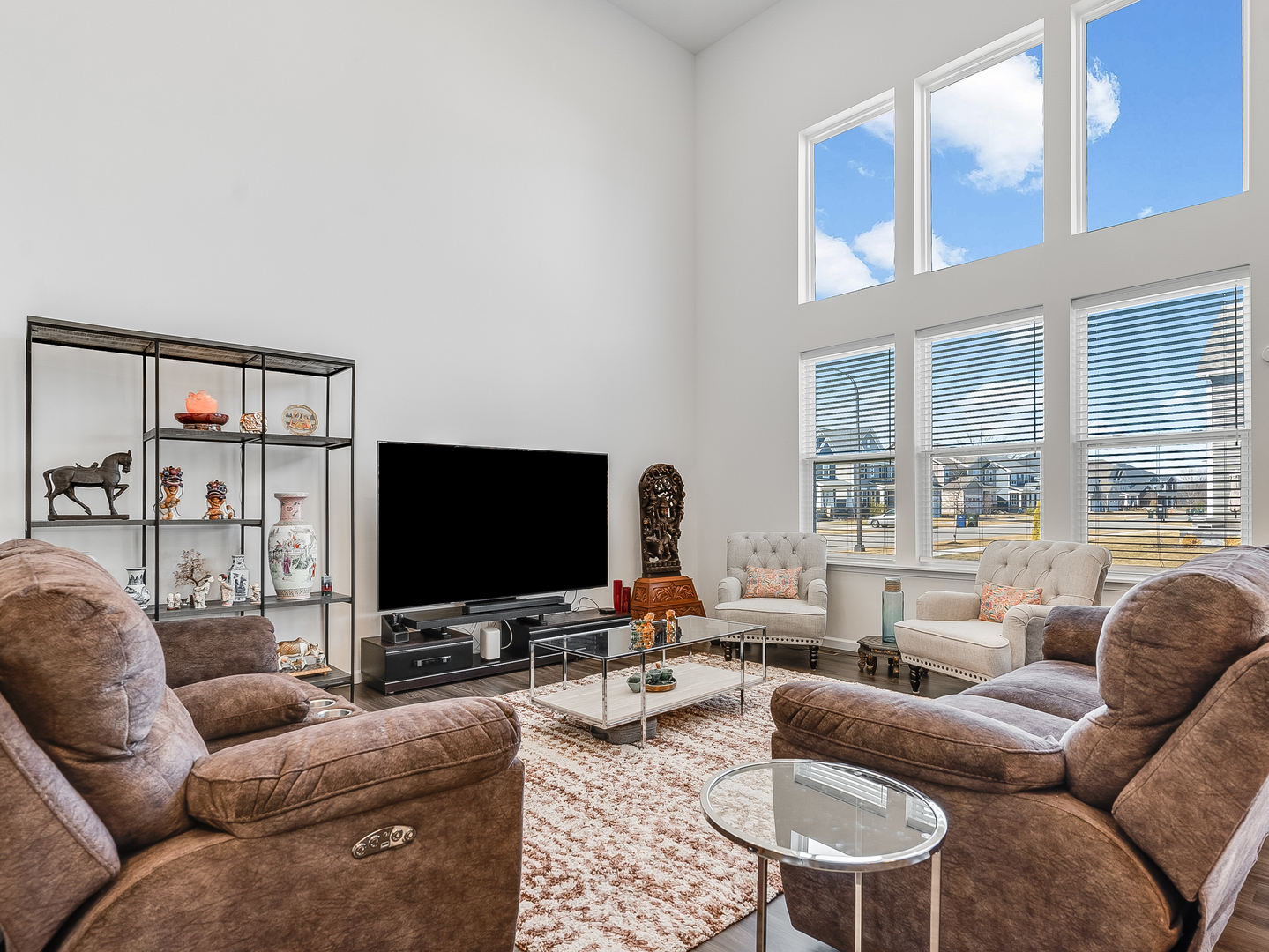 2552 Weatherbee Lane Naperville, IL 60563 - Photo 4 of 43 a living room with furniture and a flat screen tv