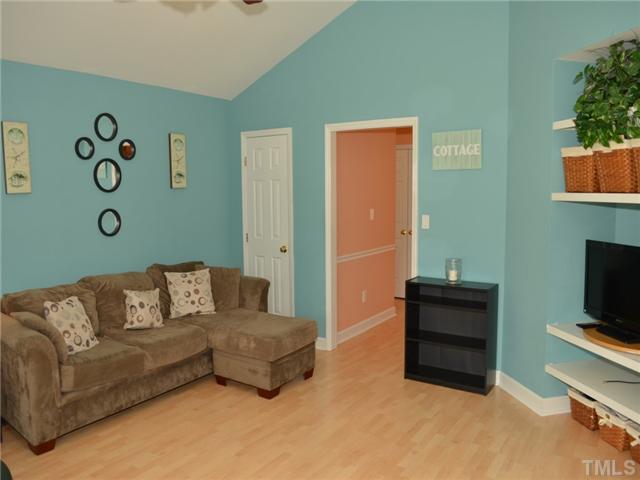 4212 Archibald Way Raleigh, NC 27616 - Photo 3 of 21 Another view of the living room. Room is large enough for sectional, or 2 couches plus side tables, etc.