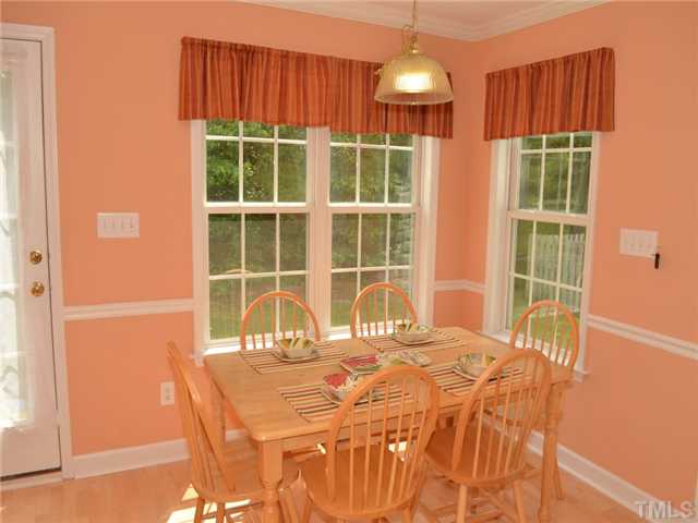 4212 Archibald Way Raleigh, NC 27616 - Photo 6 of 21 Eat in kitchen/dining area is large enough to accomodate a large table. Lots of light makes it a cheery place to eat.