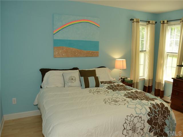 4212 Archibald Way Raleigh, NC 27616 - Photo 9 of 21 Another view of the Master bedroom. as like the rest of this houae windows bring in the light, making it a warm, cozy place to end and begin each day.