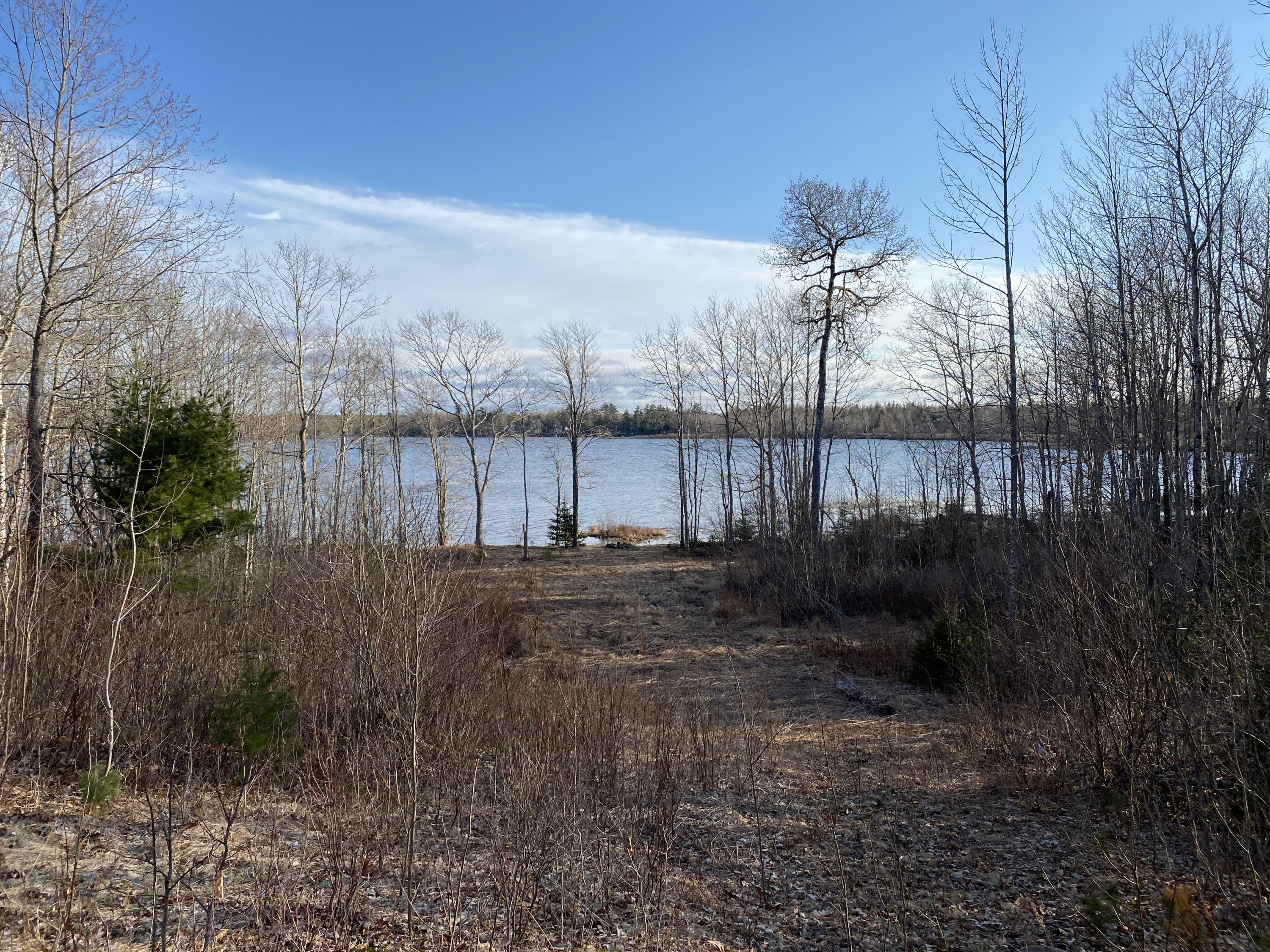 935 Ridge Road Robbinston, ME 04671 - Photo 27 of 33 porch view & wide path from home to lake