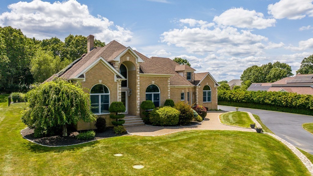 93 Narrows Road Assonet, MA 02702 - Photo 1 of 42 a front view of a house with a yard