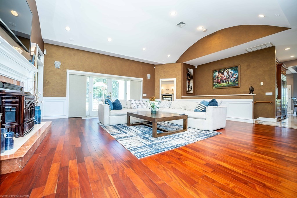 93 Narrows Road Assonet, MA 02702 - Photo 15 of 42 a living room with furniture and a kitchen view