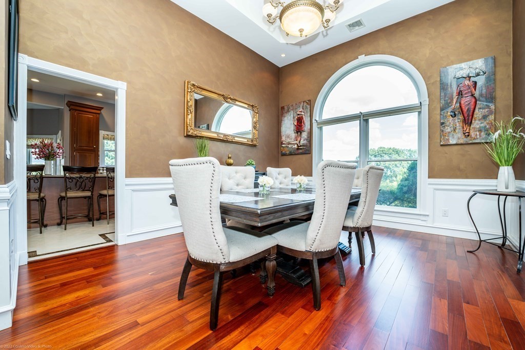 93 Narrows Road Assonet, MA 02702 - Photo 20 of 42 a view of a dining room with furniture window and wooden floor
