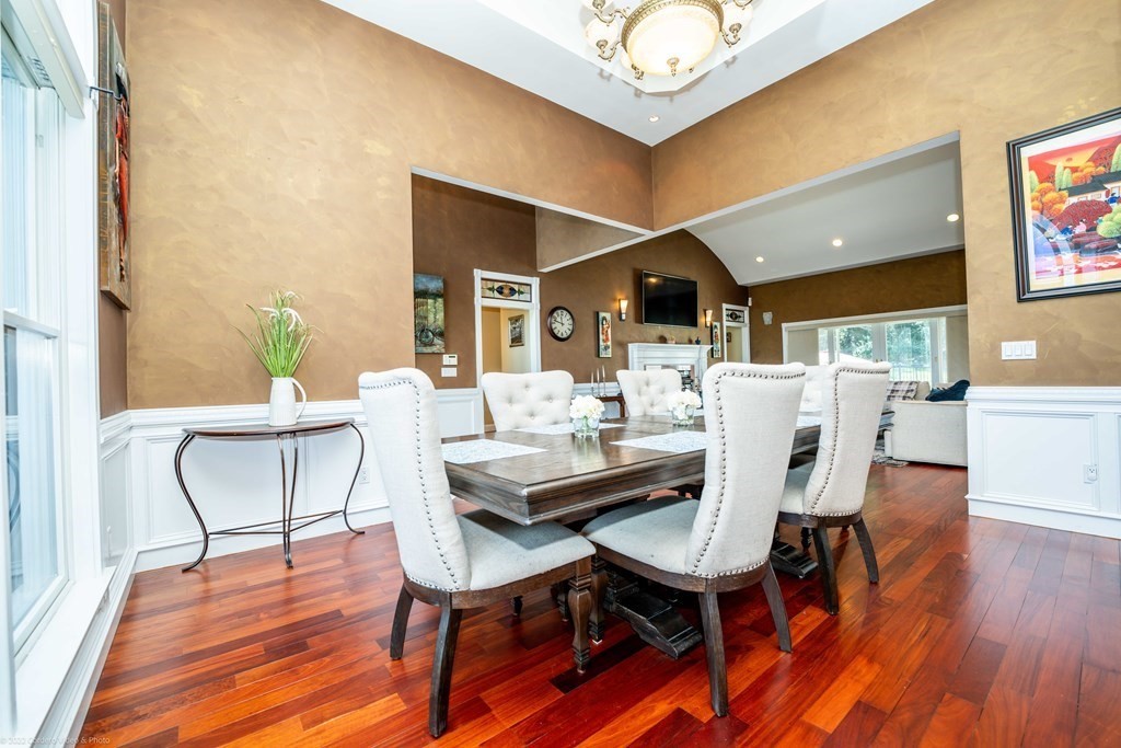 93 Narrows Road Assonet, MA 02702 - Photo 21 of 42 a view of a dining room with furniture and wooden floor