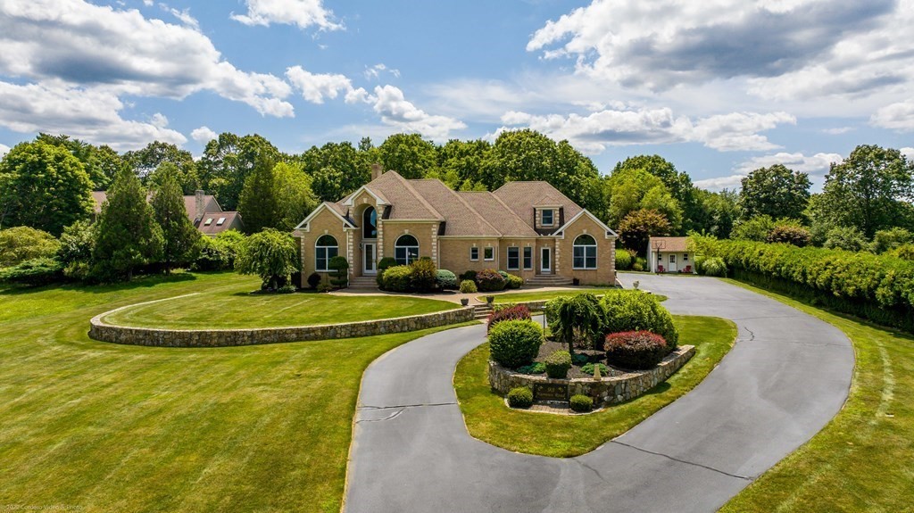 93 Narrows Road Assonet, MA 02702 - Photo 3 of 42 a view of a house with swimming pool and mountains in the background