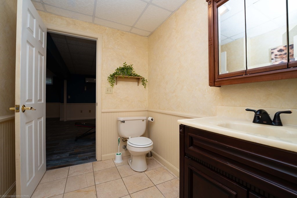 93 Narrows Road Assonet, MA 02702 - Photo 36 of 42 a bathroom with a sink a toilet and shower
