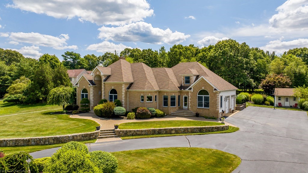 93 Narrows Road Assonet, MA 02702 - Photo 4 of 42 a view of a house with swimming pool and a yard