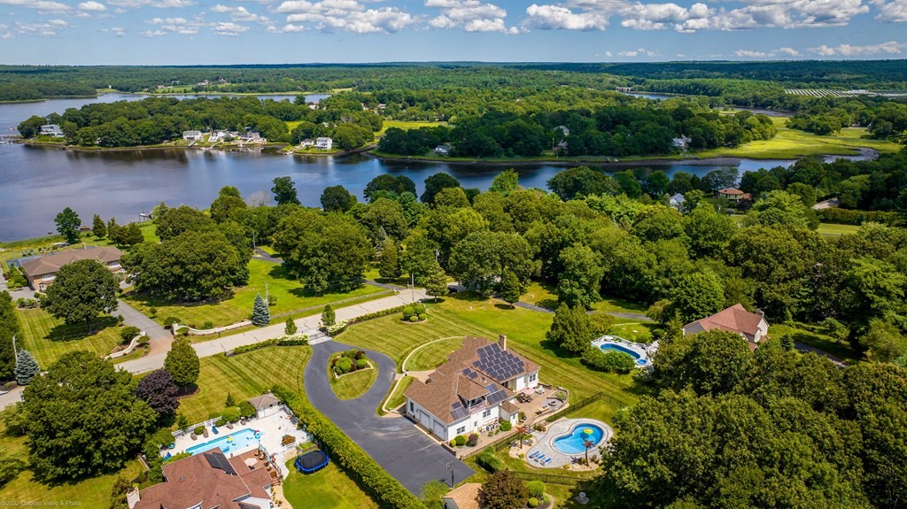 93 Narrows Road Assonet, MA 02702 - Photo 5 of 42 an aerial view of residential house with outdoor space and lake view