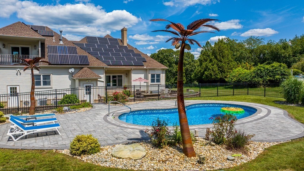 93 Narrows Road Assonet, MA 02702 - Photo 9 of 42 a view of a house with swimming pool and sitting area