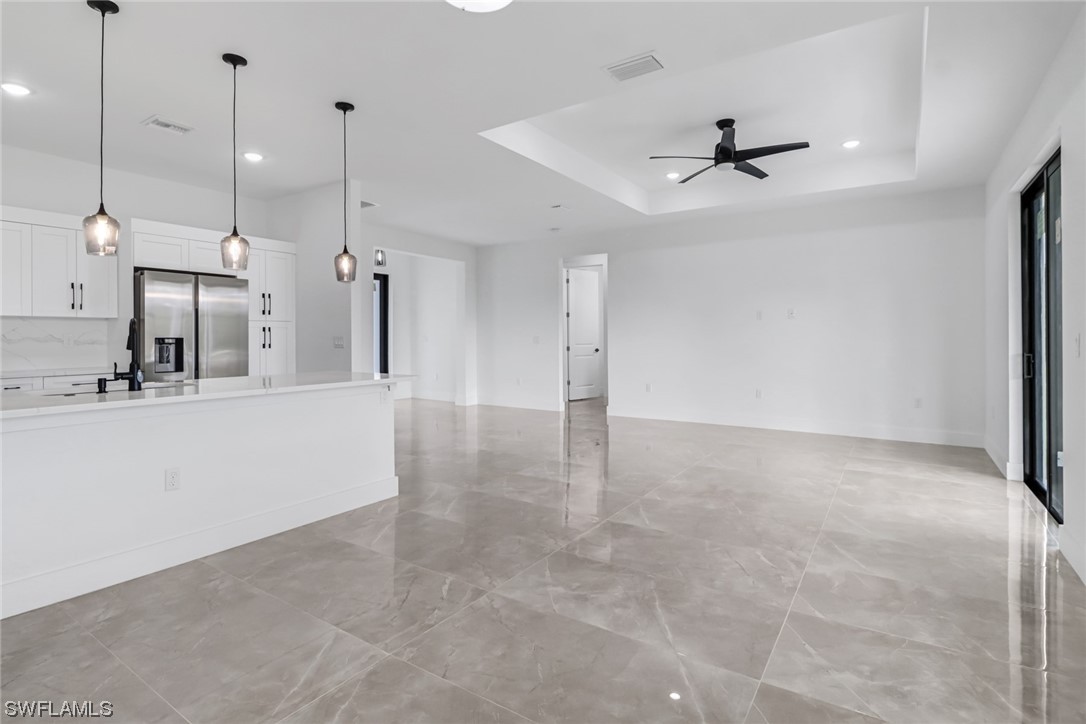 2607 4th Street Southwest Lehigh Acres, FL 33976 - Photo 12 of 21 a view of a kitchen with a sink and a window