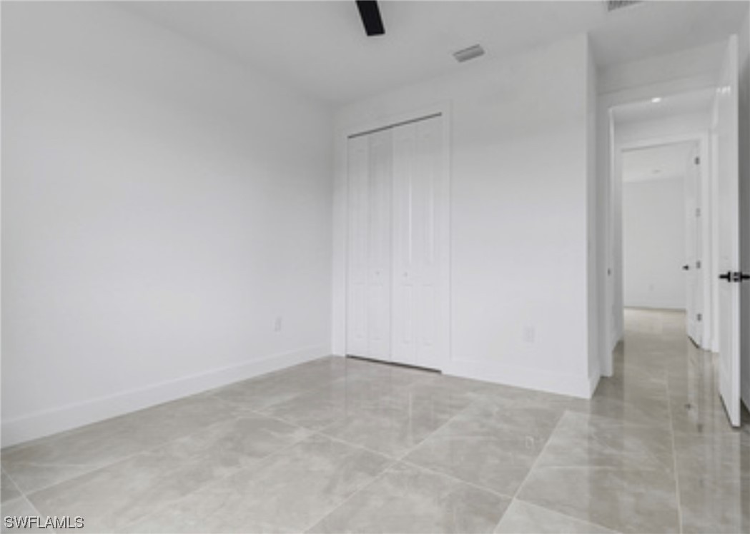 2607 4th Street Southwest Lehigh Acres, FL 33976 - Photo 16 of 21 a view of an empty room