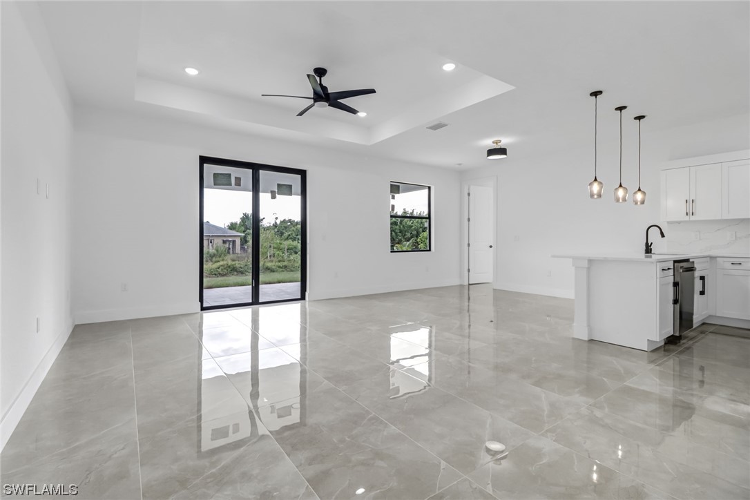 2607 4th Street Southwest Lehigh Acres, FL 33976 - Photo 8 of 21 a view of an empty room with window and cabinet