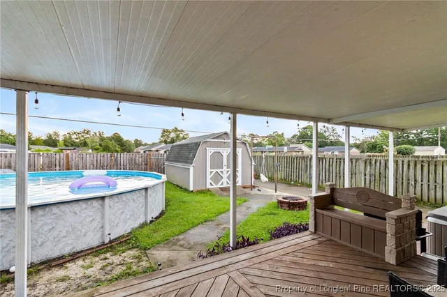 a view of a patio with couches chairs dining table and chairs