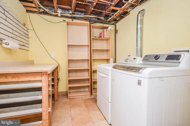 a bathroom with a bathtub and a sink