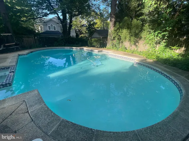a house view with a backyard space