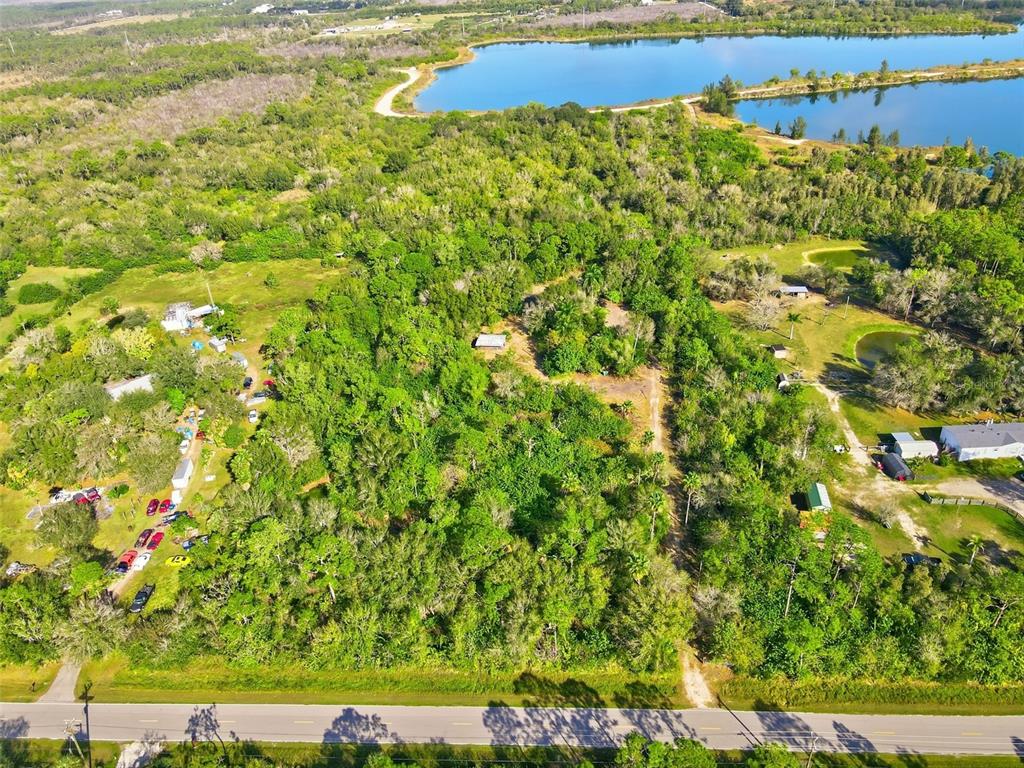 39970 Little Farm Road Punta Gorda, FL 33982 - Photo 8 of 20 a view of a bunch of trees and bushes