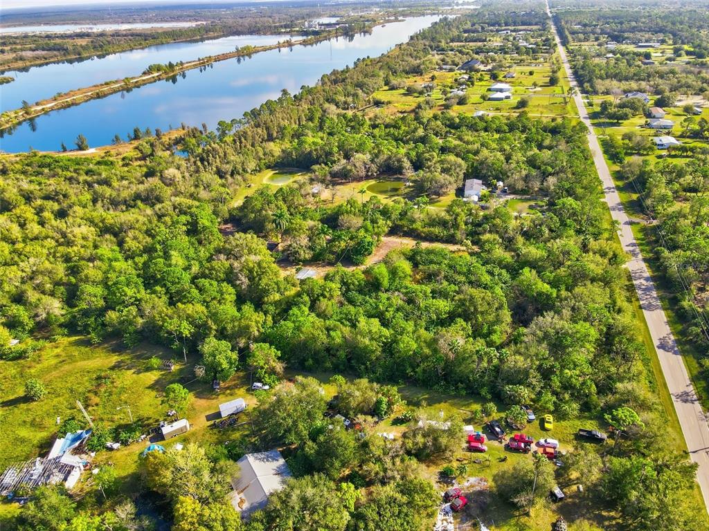 39970 Little Farm Road Punta Gorda, FL 33982 - Photo 10 of 20 a view of a large yard