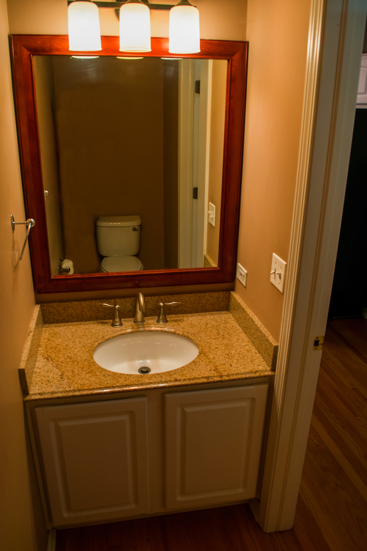 3005 Crystal Rock Road Naperville, IL 60564 - Photo 11 of 31 a bathroom with a granite countertop sink and a mirror