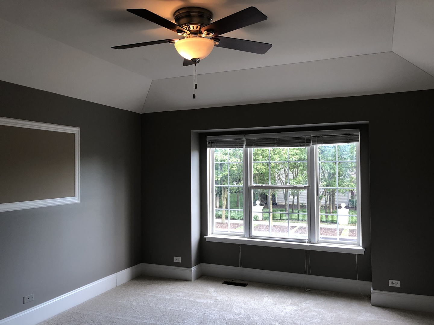 3005 Crystal Rock Road Naperville, IL 60564 - Photo 17 of 31 a view of an empty room with a window