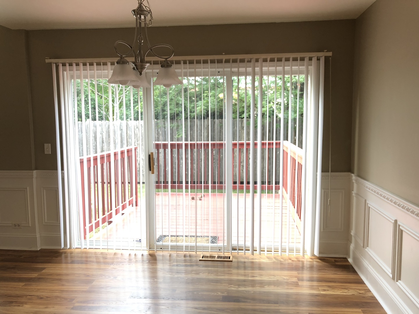 3005 Crystal Rock Road Naperville, IL 60564 - Photo 8 of 31 a view of a room with wooden floor and a floor to ceiling window