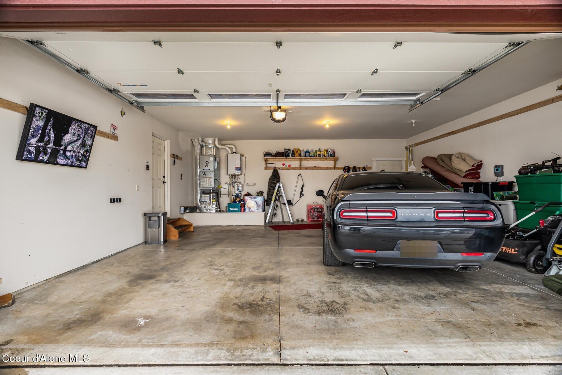 13439 North Shimmering Court Rathdrum, ID 83858 - Photo 14 of 52 Garage