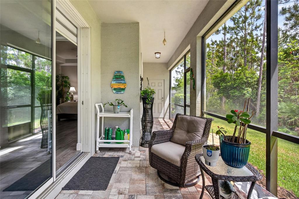66 Wrendale Loop Ormond Beach, FL 32174 - Photo 39 of 88 a living room with furniture and a fireplace