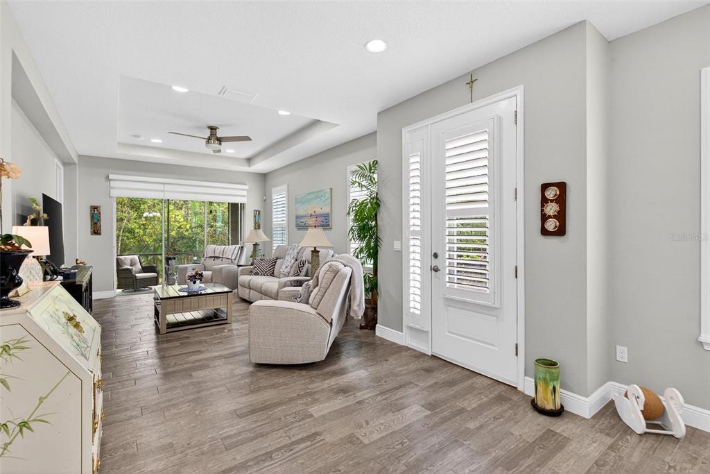 66 Wrendale Loop Ormond Beach, FL 32174 - Photo 4 of 88 a living room with furniture and wooden floor