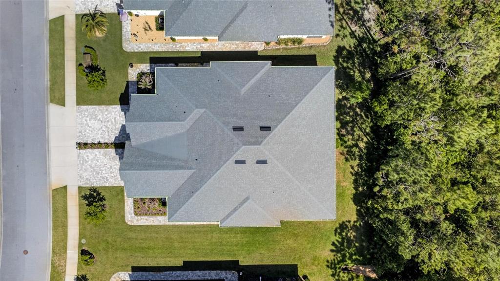 66 Wrendale Loop Ormond Beach, FL 32174 - Photo 56 of 88 an aerial view of a house with a yard