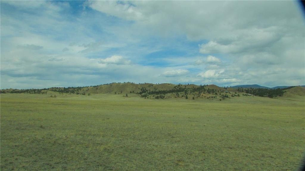 4685 Jackson Road Hartsel, CO 80449 - Photo 3 of 11 a view of a lake with a mountain