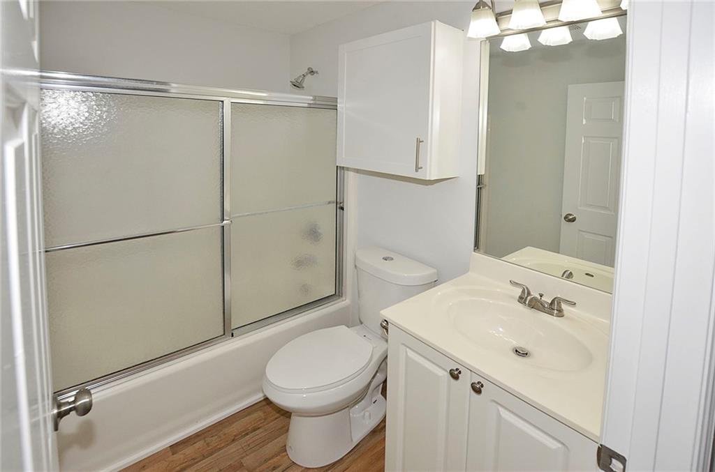 3285 3rd Place Vero Beach, FL 32968 - Photo 26 of 34 a bathroom with a sink toilet and shower