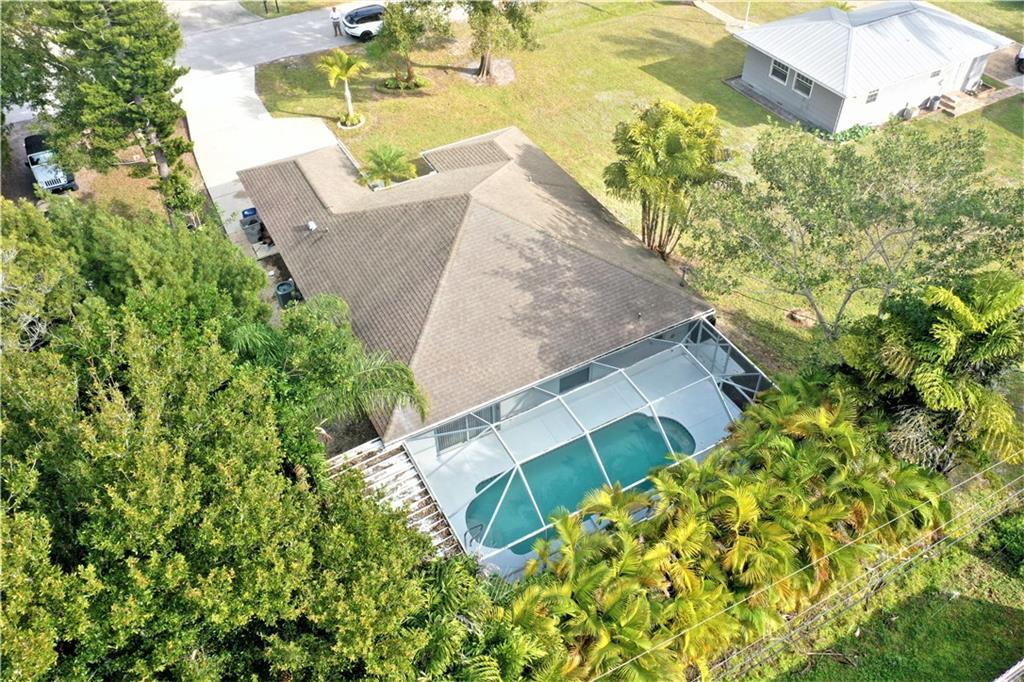 3285 3rd Place Vero Beach, FL 32968 - Photo 4 of 34 view of a house with a yard