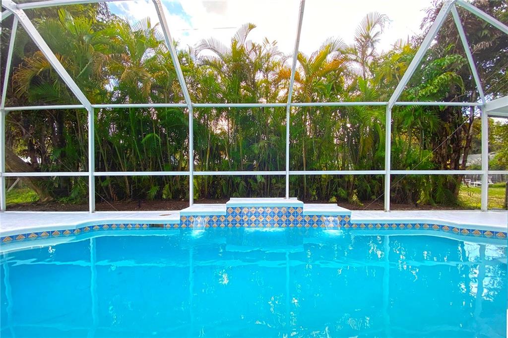 3285 3rd Place Vero Beach, FL 32968 - Photo 7 of 34 a view of roof deck with wooden floor and fence