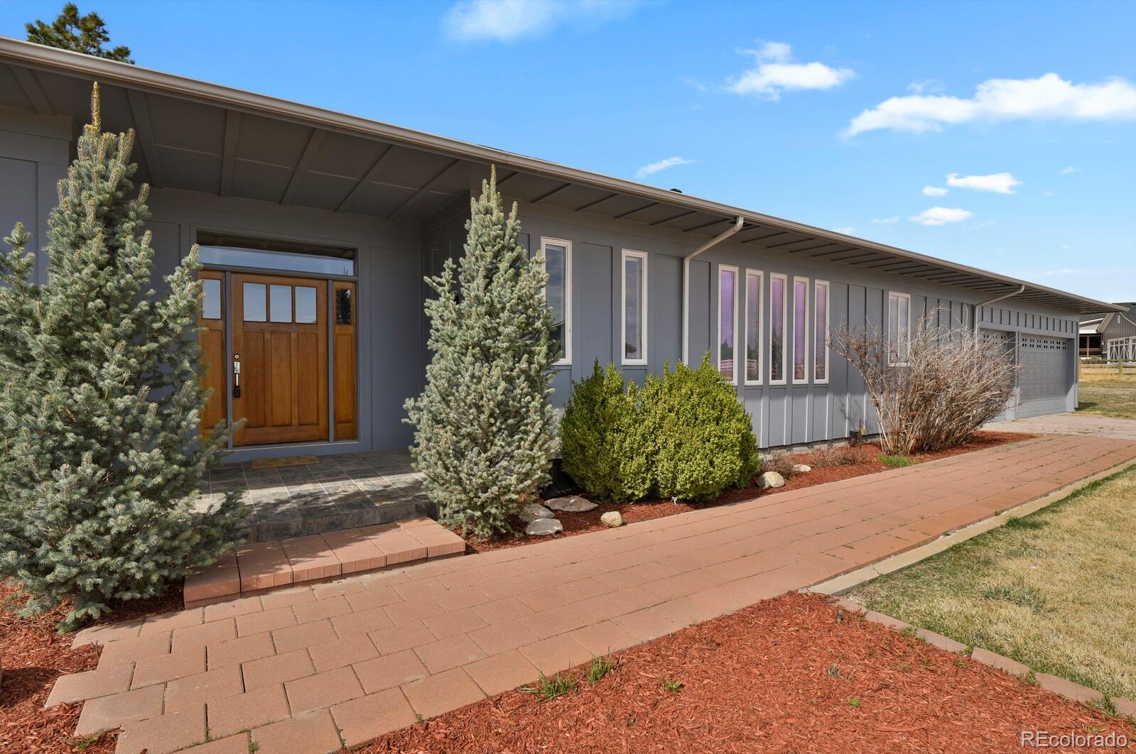 a front view of a house having yard