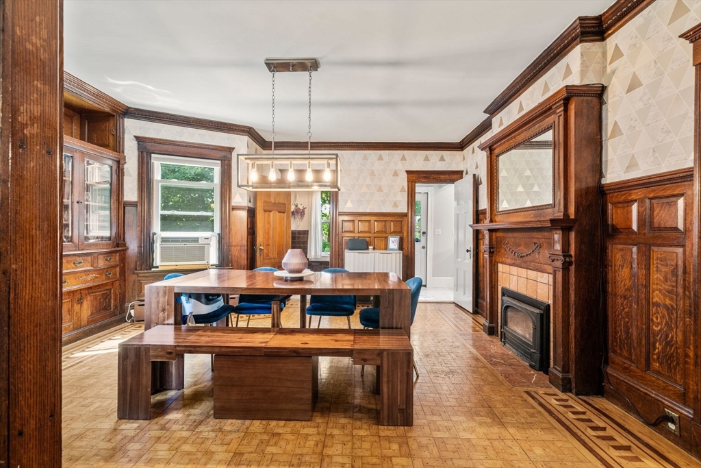 18 Mill Street Boston, MA 02122 - Photo 14 of 38 a view of a dining room with furniture window and wooden floor