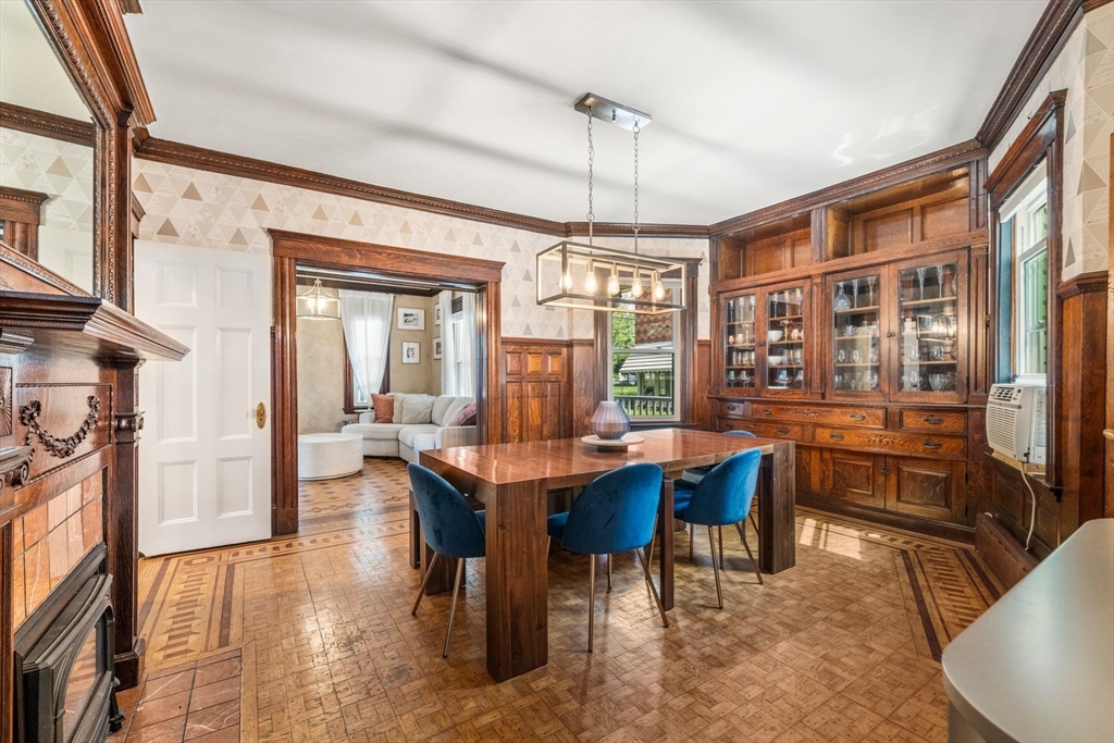 18 Mill Street Boston, MA 02122 - Photo 15 of 38 a view of a dining room with furniture window and wooden floor