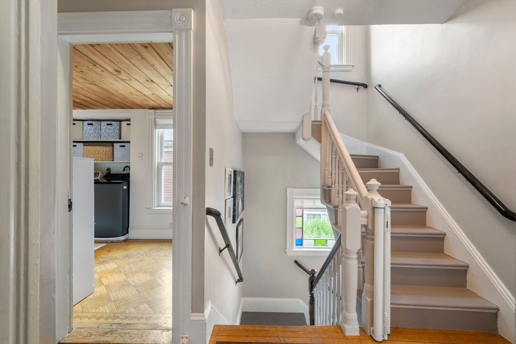 18 Mill Street Boston, MA 02122 - Photo 27 of 38 a view of entryway and hall with wooden floor