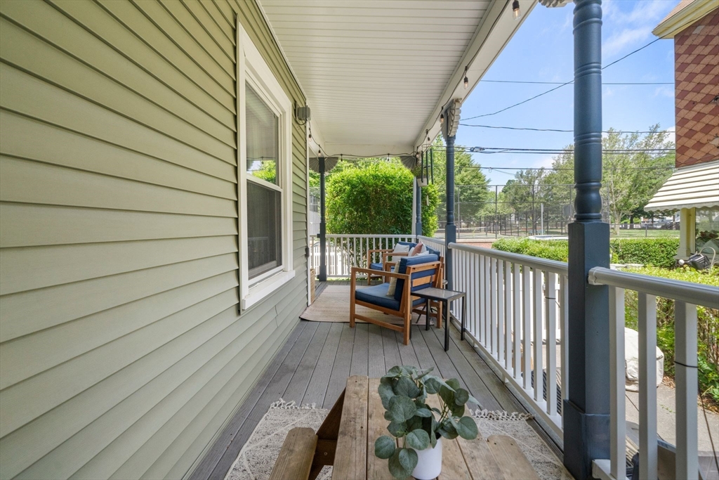 18 Mill Street Boston, MA 02122 - Photo 33 of 38 a view of a patio with wooden floor