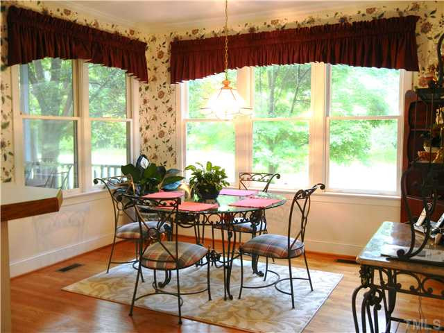 1017 Downing Way Court Raleigh, NC 27614 - Photo 11 of 25 Large eat in area. Great views of the private backyard.